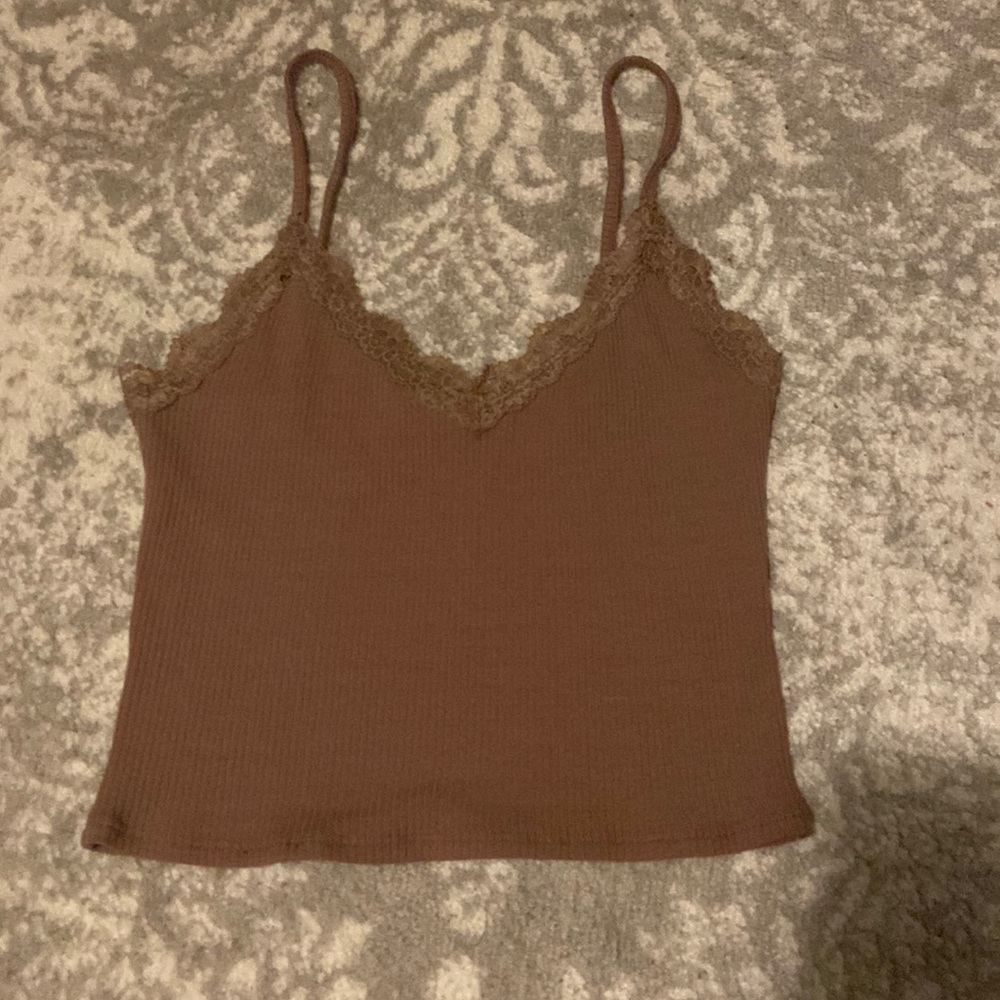 This is a brown tank top from garage in size Medium